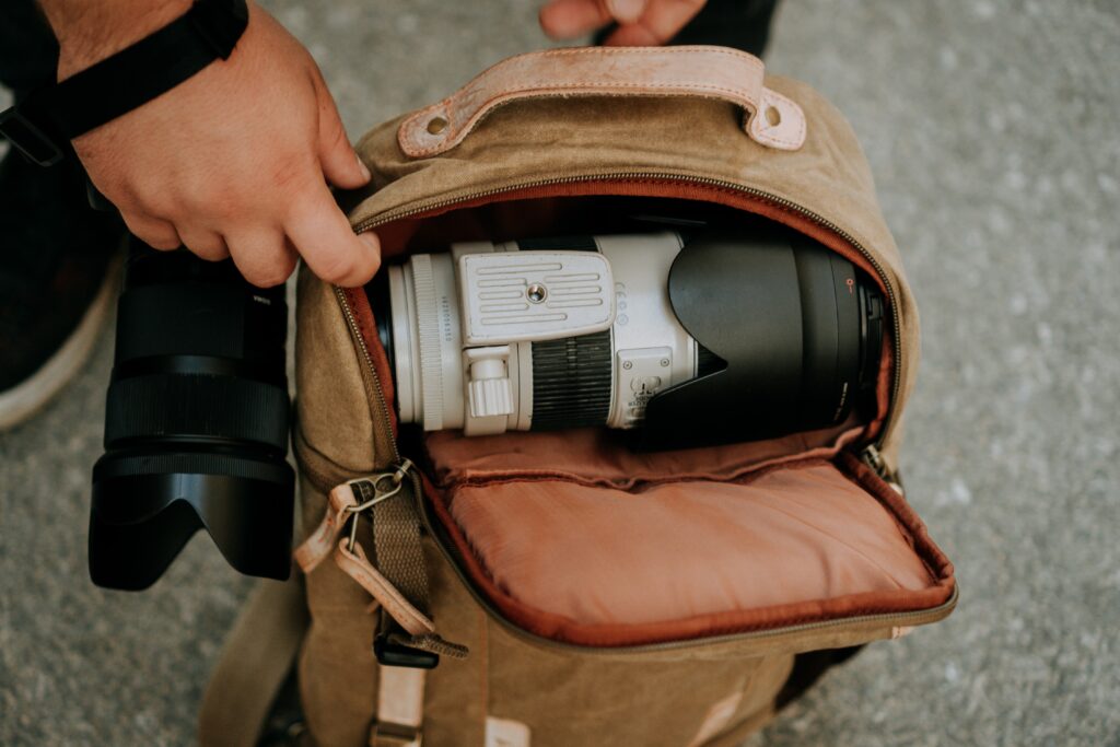How to wear camera bag?