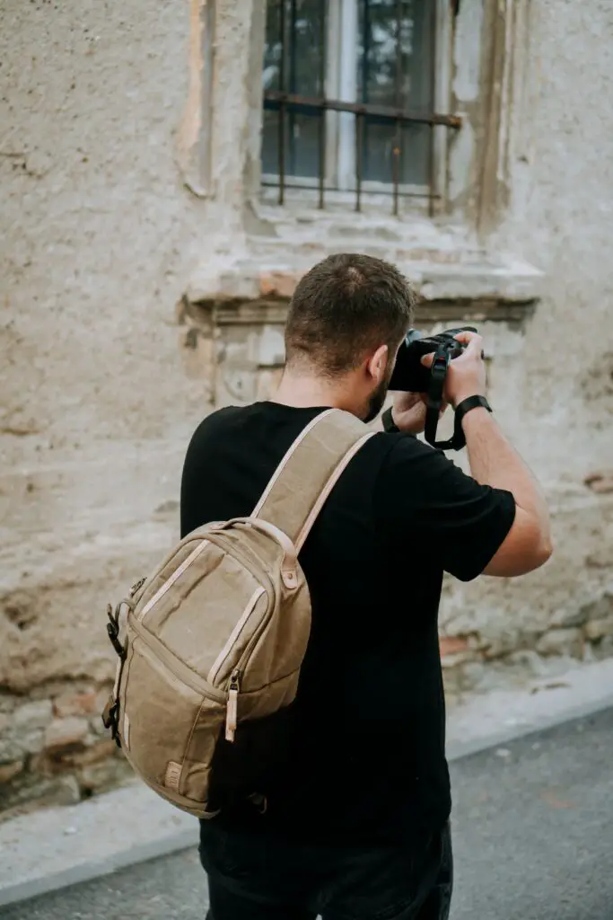 Can you fit a camera in a coach camera bag?
