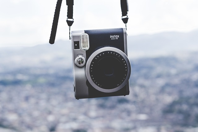 How to attach strap to instax mini Evo?