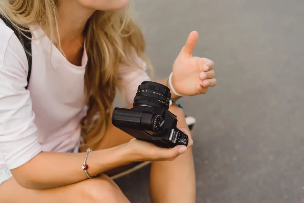 How to attach camera strap?