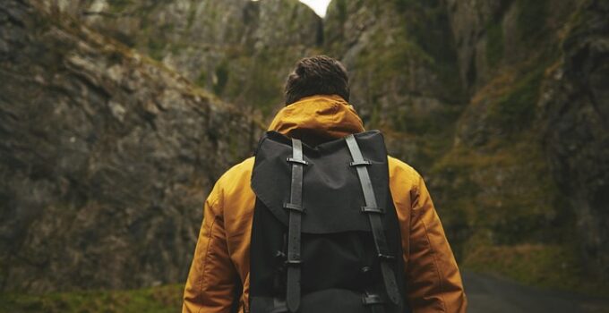 How do I clean a backpack without damaging it?