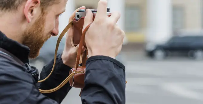 How to attach a lanyard to a camera?